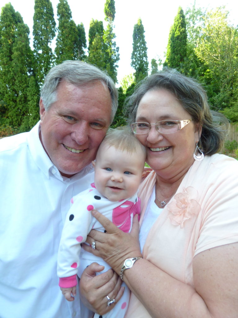 Steve and Luann Tippets with their Granddaughter, Penelope Hanson.